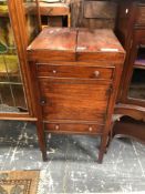 A GEORGE III MAHOGANY NIGHT TABLE, THE TOP OPENING CENTRALLY TO REVEAL A WASH BOWL RECEIVER ABOVE