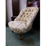 A VICTORIAN LOW BUTTON BACK CHAIR