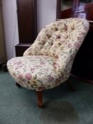 A VICTORIAN LOW BUTTON BACK CHAIR