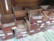 A COLLECTION OF VARIOUS CABINET DRAWERS SOME WITH ORIGINAL GLASS LAELS.