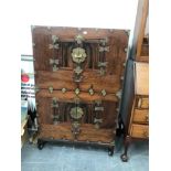 VINTAGE BRASS BOUND KOREAN TWO PART CABINET ON STAND H 127 x W 81 x D 41cms