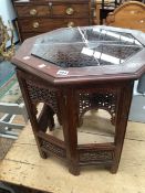 AN INDIAN BRASS INLAID CARVED HARDWOOD OCTAGONAL STAND