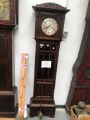 A 20th C. GLAZED OAK LONG CASED CLOCK, THE THREE TRAIN MOVEMENT WITH A CIRCULAR DIAL OF ARABIC