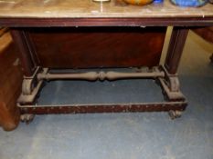 A EARLY VICTORIAN CARVED MAHOGANY ADJUSTABLE TABLE, ( FOR RESTORATION) W 123cms