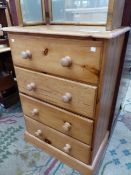 A PINE FOUR DRAWER CHEST. H 98 x W 66 x D 43 cms