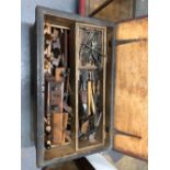 AN IMPRESSIVE CARPENTERS TOOL CHEST WITH A GOOD COMPLIMENT OF PLANES, CHISELS, SAWS ETC.
