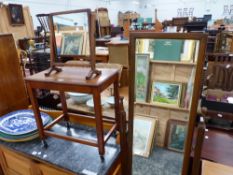 AN OAK FULL LENGTH CHEVAL MIRROR, A DRESSING TABLE MIRROR TOGETHER WITH A MAHOGANY COFFEE TABLE WITH