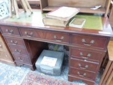 A MAHOGANY GEORGIAN STYLE TWIN PEDESTAL DESK WITH INSET GREEN LEATHER TOP. H 79 W 122 D 59cms