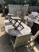 TEAK GARDEN TABLE AND EIGHT CHAIRS