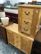 A CONTEMPORARY OAK SMALL SIDE BOARD TOGETHER WITH A THREE DRAWER CHEST.