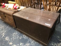 AN ANTIQUE PINE LIFT TOP BLANKET BOX TOGETHER WITH VARIOUS CLOCK PARTS AND A TIN TRUNK.