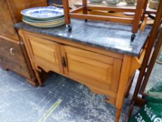 A GRAY MARBLE TOPPED PINE WASH STAND WITH TWO DOOR FRONT AND TOWEL RAIL ENDS ABOVE BALUSTER LEGS