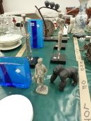 FOUR METAL GOLFING FIGURES, AN ASPIRIN PAPERWEIGHT, A BIRD GROUP AND TWO BLUE GLASS VASES