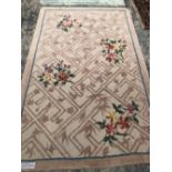 A FLORAL HOOKED RUG 239 x 150 cm's