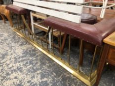 A LARGE BRASS CLUB FENDER WITH STUDDED LEATHER SEAT. W 190 D 53cms