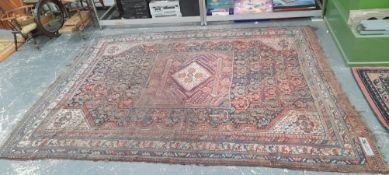 AN ANTIQUE PERSIAN SHIRAZ CARPET 286 x 218cms