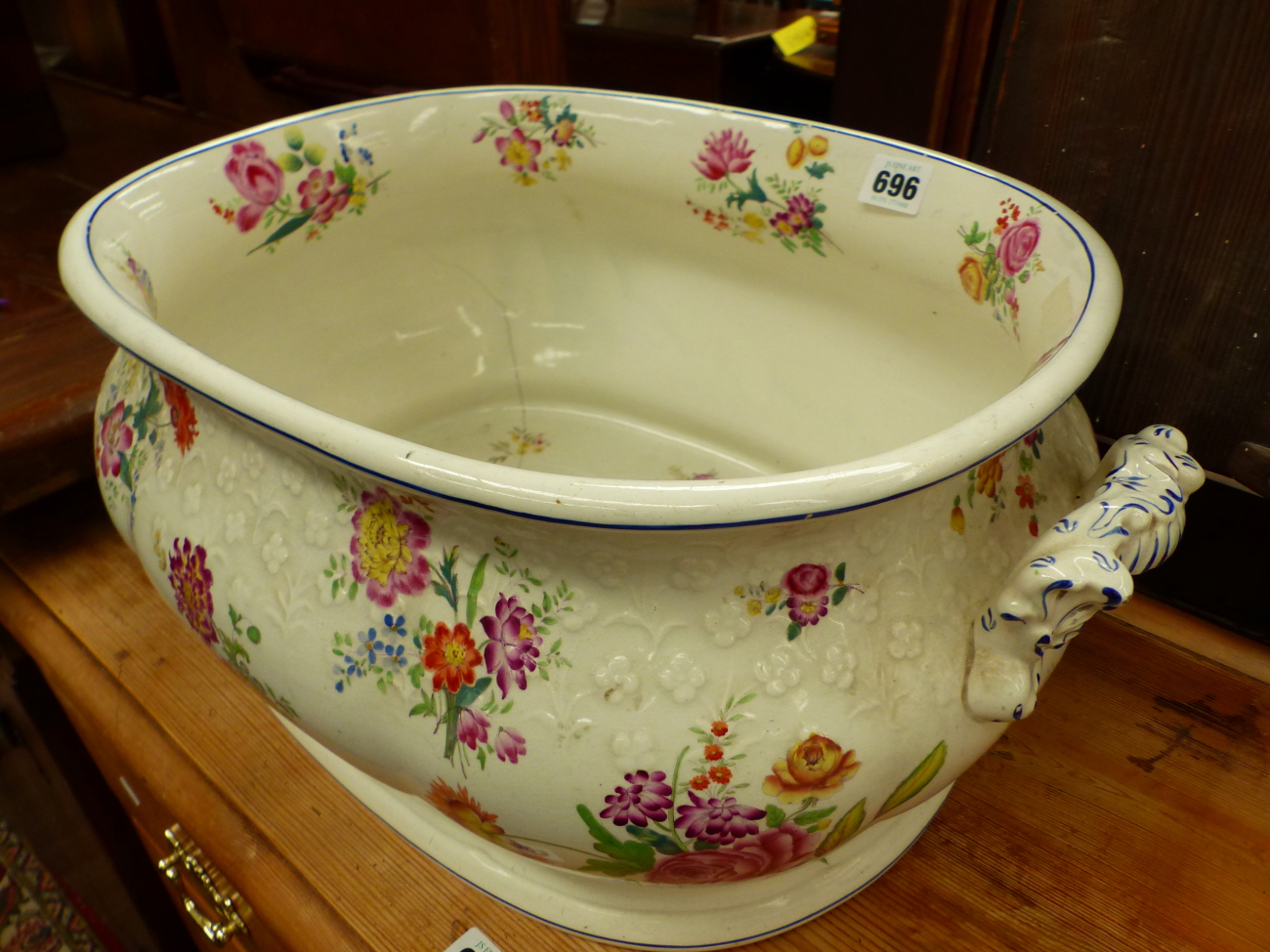 A LARGE ANTIQUE FOOT BATH.