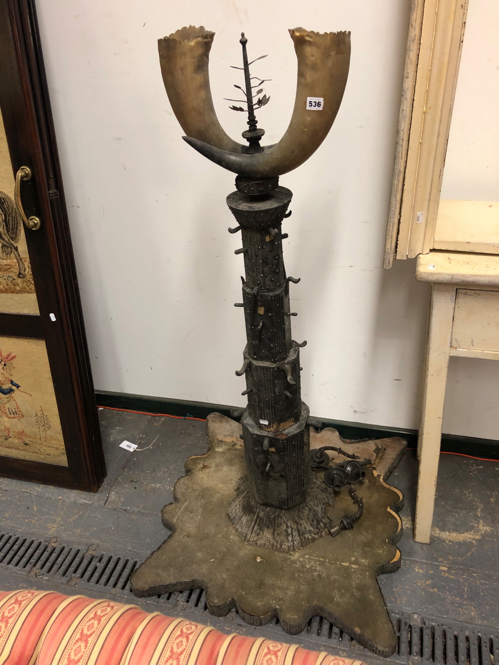 AN UNUSUAL EASTERN, HORN MOUNTED, FLOOR STANDING, CANDLE STAND CENTREPIECE.