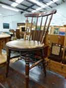 A MAHOGANY CIRCULAR SEATED STICK BACKED CHAIR