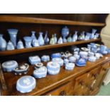 AN EXTENSIVE COLLECTION OF WEDGWOOD JASPER WARES, LIDDED BOXES, BELLS, VASES, CUPS AND SAUCERS,