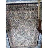 A MACHINE MADE RUG OF PERSIAN TABRIZ DESIGN 190 x 126 cms