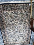 A MACHINE MADE RUG OF PERSIAN TABRIZ DESIGN 190 x 126 cms