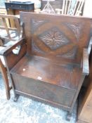 A VINTAGE CARVED OAK SMALL MONKS BENCH