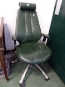 A VINTAGE ADJUSTABLE OFFICE ARM CHAIR