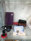 AN ANTIQUE CORONATION COOKERY BOOK A PENTAX AUTO 110 CAMERA AND VARIOUS LENSES AND A PLATINUM