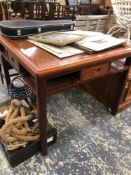 A CONTEMPORARY CHINESE CARVED HARDWOOD FOUR DRAWER CENTRE TABLE WITH REVERSIBLE TOP. H 74 W 92cms