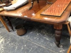 A LATE VICTORIAN WALNUT EXTENDING DINING TABLE. W OPEN 178cms H. 74cms D. 106cms