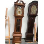 A WALNUT LONG CASE CLOCK WITH GLAZED CASE DOOR. HEIGHT 210 cms