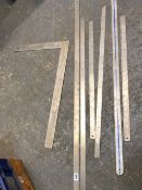 A QUANTITY OF STEEL RULES AND A SQUARE INCLUDING RAYBONE, SENATOR, ETC.
