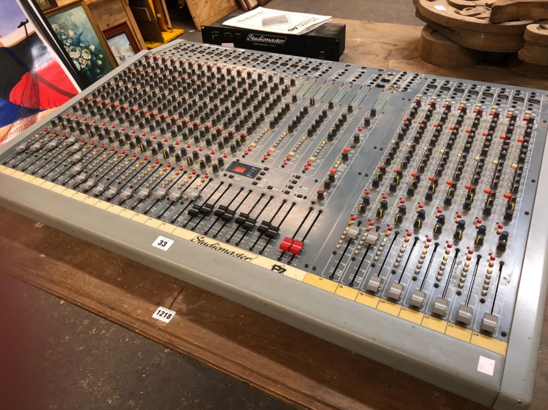 A STUDIO MASTER P7 MULTITRACK MIXING CONSOLE WITH MANUAL AND EXTERNAL POWER SUPPLY UNIT