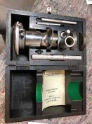 A BURTON UNIVERSAL HARDNESS TESTER IN CASE WITH INSTRUCTIONS.