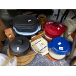 LE CREUSET COOKING VESSELS, BREAD BOARDS, STONE WARE HOT WATER BOTTLES AND JARS