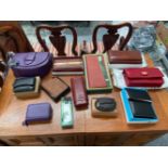 A COLLECTION OF PURSES, WALLETS AND BAGS TO INCLUDE VISCONTI, GRAFFTI, TONY PEROTTI THE BRIDGE