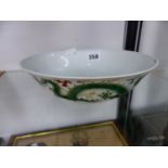 A CHINESE BOWL, THE EXTERIOR PAINTED IN FAMILLE VERTE ENAMELS WITH TWO DRAGONS