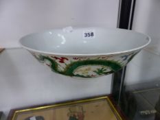 A CHINESE BOWL, THE EXTERIOR PAINTED IN FAMILLE VERTE ENAMELS WITH TWO DRAGONS