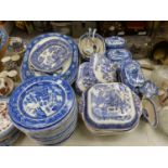 A QUANTITY OF BLUE AND WHITE WILLOW PATTERN WARES TOGETHER WITH WEDGWOOD COFFEE AND DESSERT