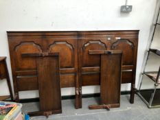 A PAIR OF OAK SINGLE BED HEAD AND FOOT BOARDS