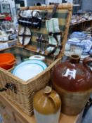 A FITTED PICNIC BASKET TOGETHER WITH TWO STONEWARE FLASKS