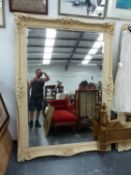 AN IMPRESSIVE LARGE CLASSICAL STYLA FRAMED WALL MIRROR.