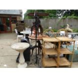 A PAIR OF THREE TIER BAMBOO STANDS, TOGETHER WITH A PAINTED WROUGHT IRON STANDARD LAMP AND A