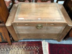 A MID 20th C. CHINESE HARDWOOD COFFER WITH CARVED BANDS TO THE LID AND FRONT. W 101 x D 60 x H