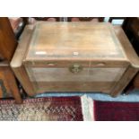 A MID 20th C. CHINESE HARDWOOD COFFER WITH CARVED BANDS TO THE LID AND FRONT. W 101 x D 60 x H