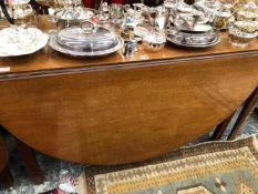 A 19th C. MAHOGANY OVAL FLAP TOP TABLE ON SQUARE SECTIONED LEGS. W 56 CLOSED x D 121 x H 72cms.