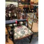 A 19th C. MAHOGANY CHAIR WITH AN ANTHEMION CARVED BELOW THE TOP RAIL, AN ELBOW CHAIR EN SUITE AND