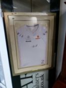 A SIGNED LEWIS HAMILTON MERCEDES BENZ SHIRT FRAMED.