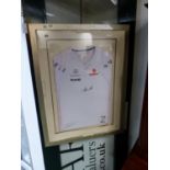 A SIGNED LEWIS HAMILTON MERCEDES BENZ SHIRT FRAMED.